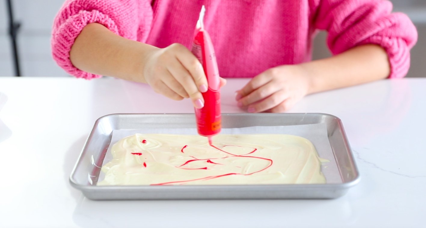 STEP SEVEN: Add dots and lines of sparkle gel icing