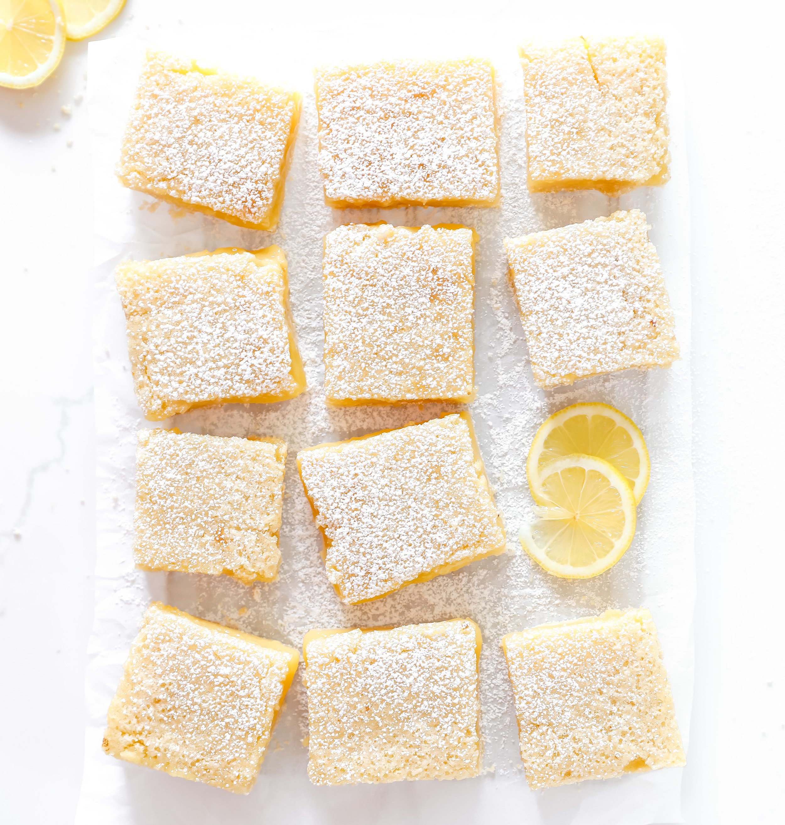 Delicious lemon bars with a buttery crust and tangy lemon filling dusted with powdered sugar